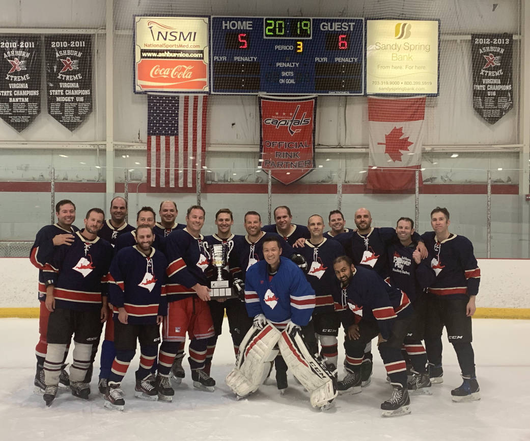 a team photo of OrrLoco as the 2019 D-league hockey champions