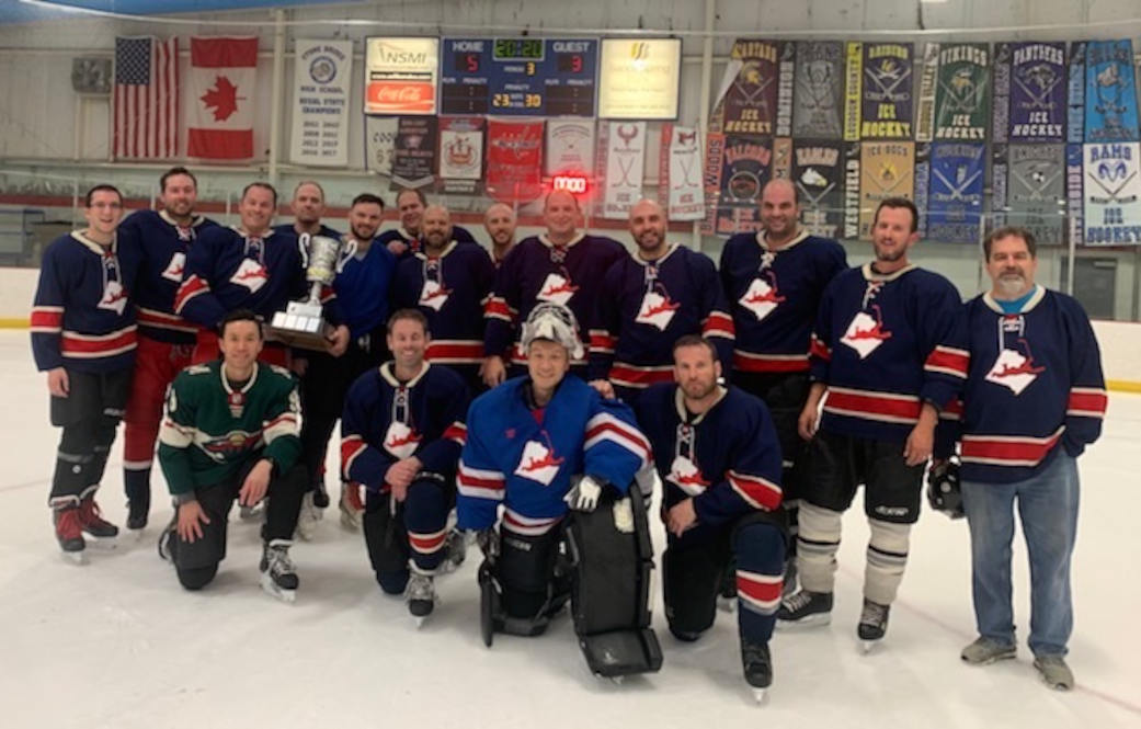 a team photo of OrrLoco as the 2020 D-league hockey champions