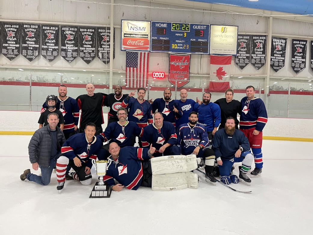 a team photo of OrrLoco as the 2022 D-league hockey champions