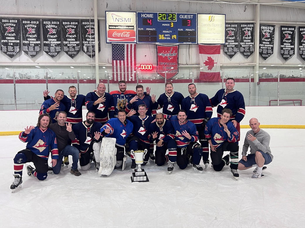 a team photo of OrrLoco as the 2023 D-league hockey champions